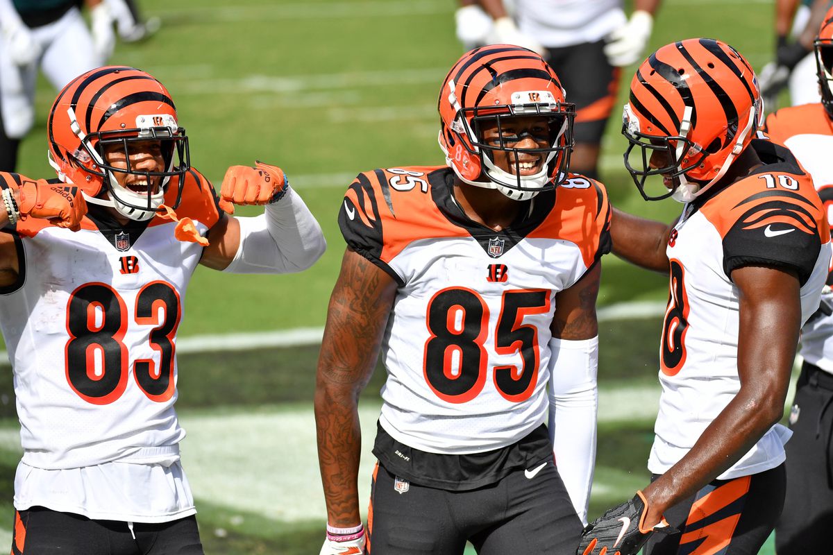Cincinnati Bengals wide receiver Tee Higgins (85) celebrates his touchdown catch with wide receiver Tyler Boyd (83) and wide receiver A.J. Green (18) against the Philadelphia Eagles during the second quarter at Lincoln Financial Field.