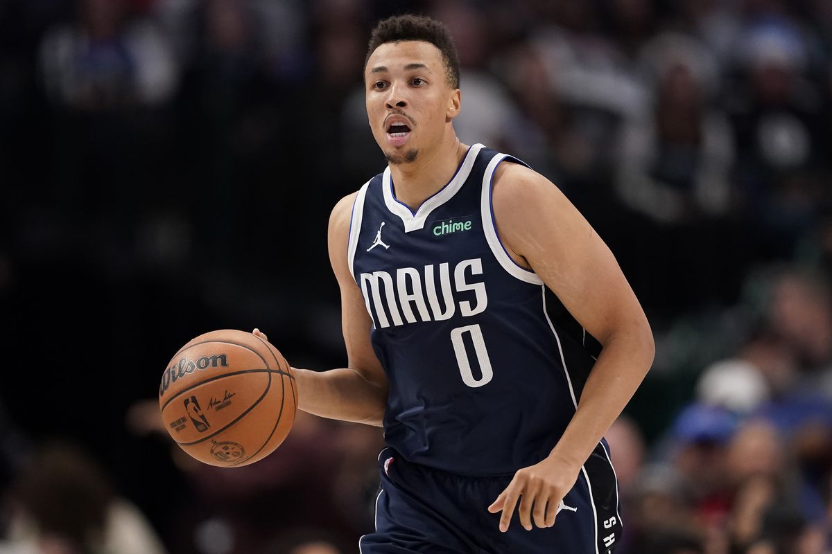 Dante Exum of the Dallas Mavericks brings the ball up court during the second half against the San Antonio Spurs at American Airlines Center on December 23, 2023 in Dallas, Texas.