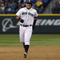 Seattle Mariners' Jesus Montero rounds the bases after hitting a two-run home run in the sixth inning of a baseball game against the Los Angeles Angels, Saturday, April 27, 2013, in Seattle. 