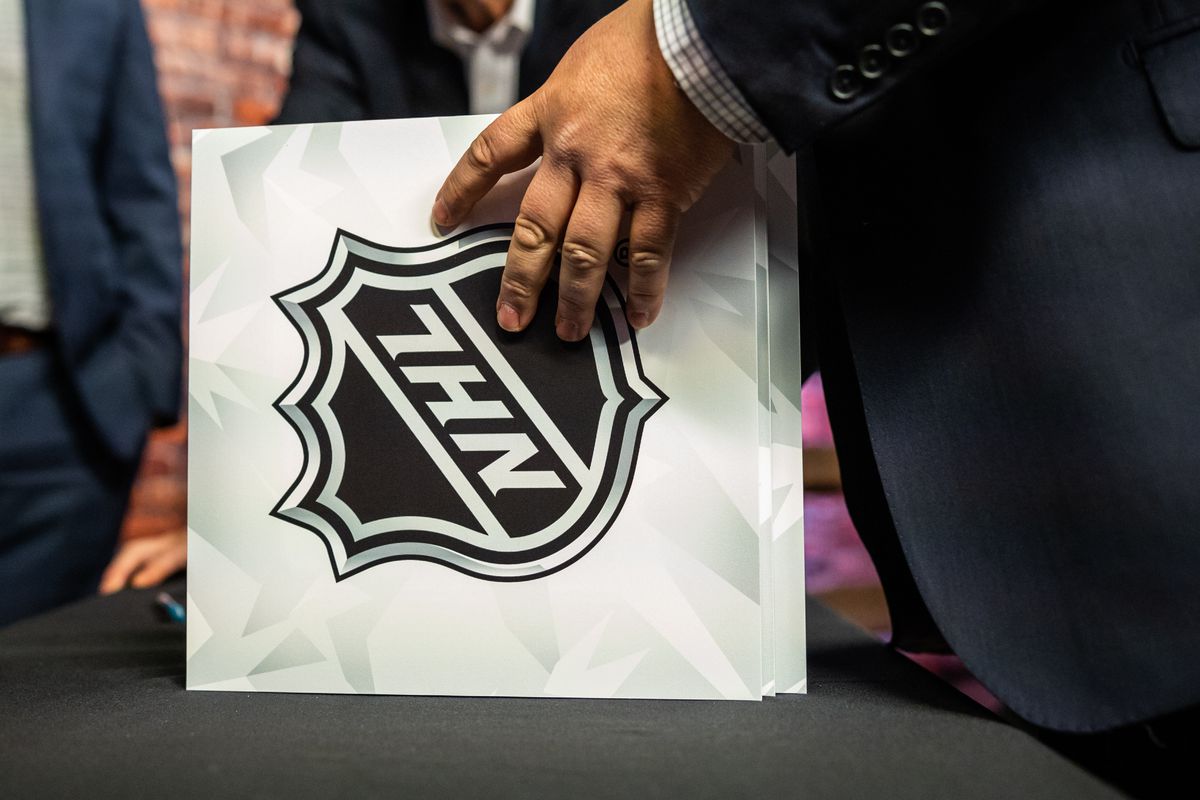 TORONTO, ON - APRIL 10: An NHL official stacks the cards during The National Hockey League Draft Lotteryat the CBC Studios on April 10, 2019 in Toronto, Ontario, Canada.