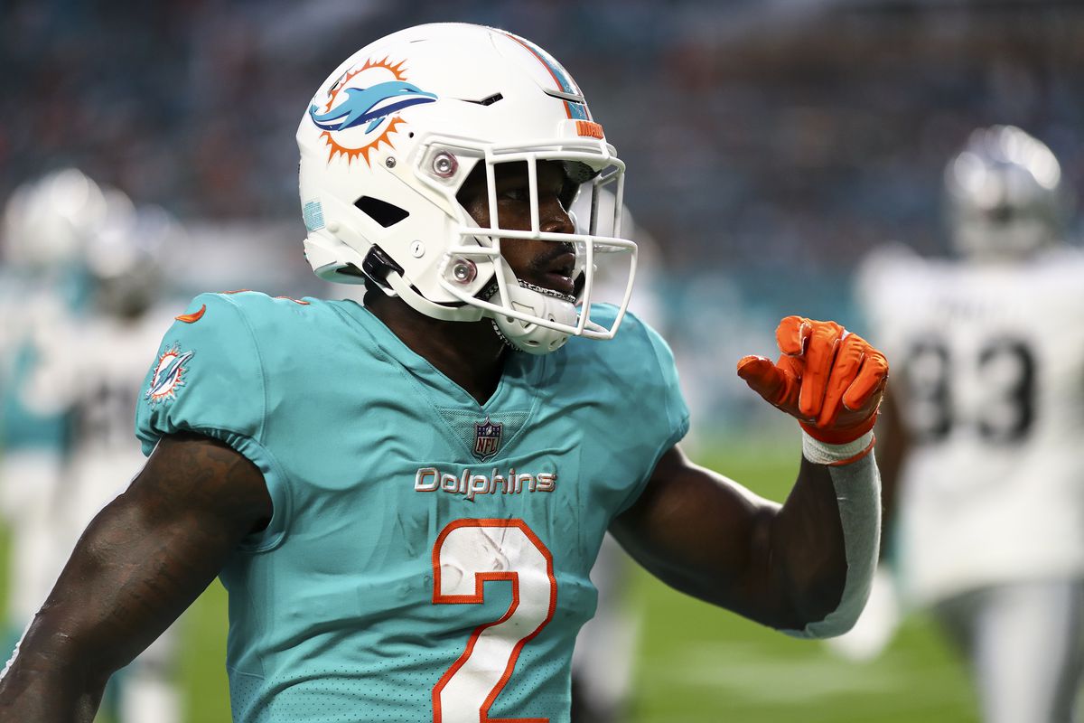 Chase Edmonds #2 of the Miami Dolphins celebrates after a play during a preseason NFL football game against the Las Vegas Raiders at Hard Rock Stadium on August 20, 2022 in Miami Gardens, Florida.