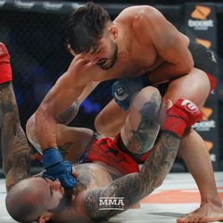 Dennis Buzukja rains down punches on Ryan Castro at Bellator 208 at the Nassau Coliseum in Uniondale, N.Y.