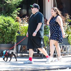 Finally, Jonah Hill walks his dog in all black (though accessorizes with a smile). 