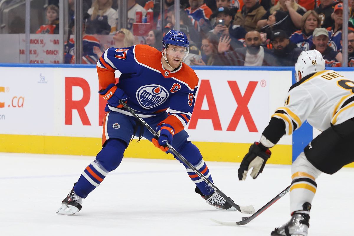 Connor McDavid of the Edmonton Oilers skates with the puck against the Boston Bruins in the second period on February 27, 2023 at Rogers Place in Edmonton, Alberta, Canada.