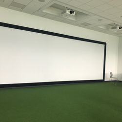 The facility sports some of the newest tech - including this giant Virtual Reality screen for players to relive practice