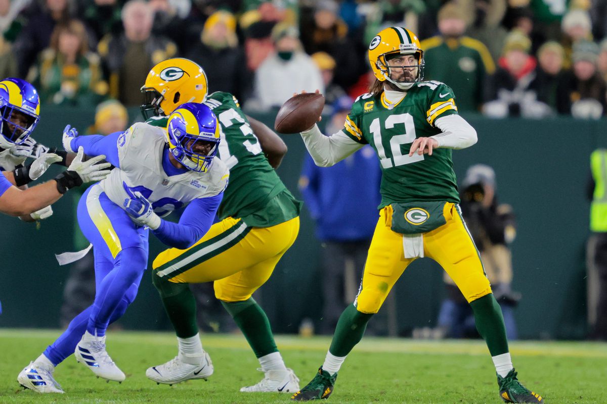 Green Bay Packers quarterback Aaron Rodgers (12) looks to pass against the Los Angeles Rams in the fourth quarter during their football game Sunday, November 28, 2021, at Lambeau Field in Green Bay, Wis.