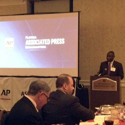 Attorney Benjamin Crump, for Trayvon Martin's parents, discusses how social media played a role in the high profile 2012 shooting case of Trayvon Martin during the Florida Associated Press Broadcasters Banquet, Saturday, April 27, 2013, in Orlando, Fla. Defense attorney Mark O'Mara, for George Zimmerman, also spoke during the event. Zimmerman has been charged with second-degree murder. 
