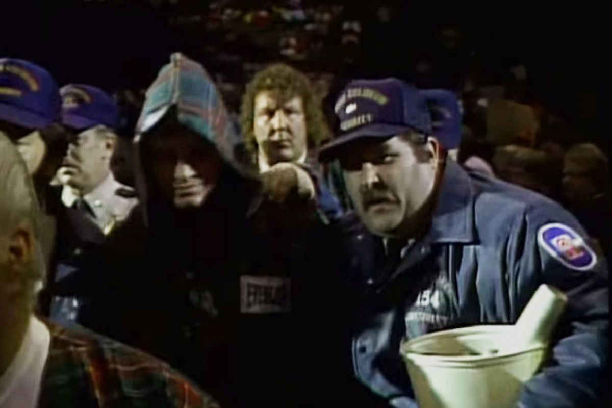 "Rowdy" Roddy Piper and a Nassau Coliseum security guard, Wrestlemania II, April 7, 1986.