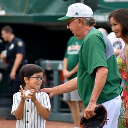 Jim Morris and his family enjoy some time on the field before the longtime head coach’s last home game.