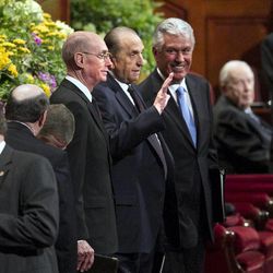The First Presidency walks onto the stand for the afternoon session Saturday, April 6, 2013 of the 183th Annual General Conference of The Church of Jesus Christ of Latter-day Saints in the Conference Center.