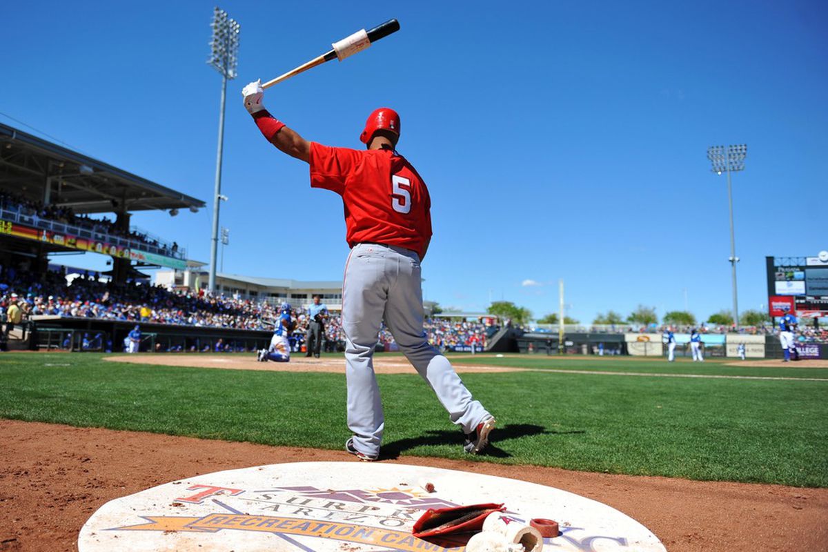 Mar 20, 2012; Surprise, AZ, USA; Los Angeles Angels first baseman Albert Pujols (5) in the on deck circle before his at bat in the first inning against the Kansas City Royals at Surprise Stadium. Mandatory Credit: Christopher Hanewinckel-US PRESSWIRE