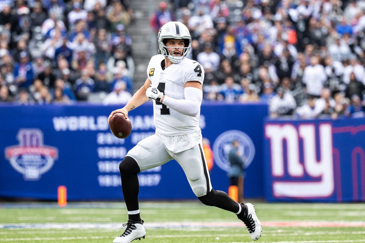 Derek Carr #4 of the Las Vegas Raiders rolls out to pass during the second quarter of a game against the New York Giants at MetLife Stadium on November 07, 2021 in East Rutherford, New Jersey.