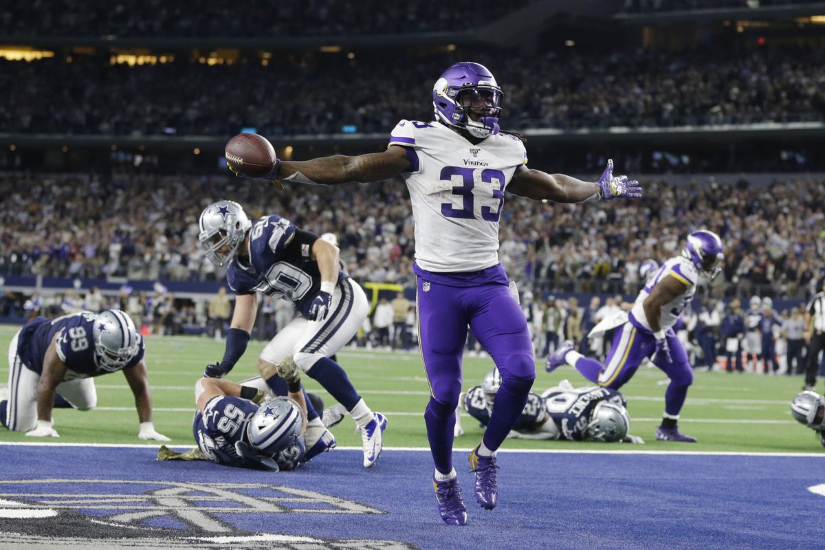 Minnesota Vikings running back Dalvin Cook scores a touchdown against Dallas Cowboys outside linebacker Sean Lee and outside linebacker Leighton Vander Esch in the third quarter at AT&amp;T Stadium.&nbsp;