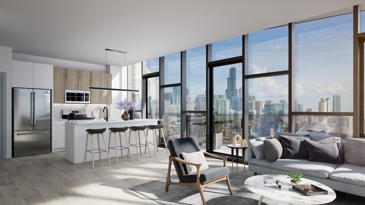 A rendering of an apartment unit with a glass wall overlooking the city. There’s a white and wood kitchen and a sitting area with a gray sofa, chair, and coffee table. 