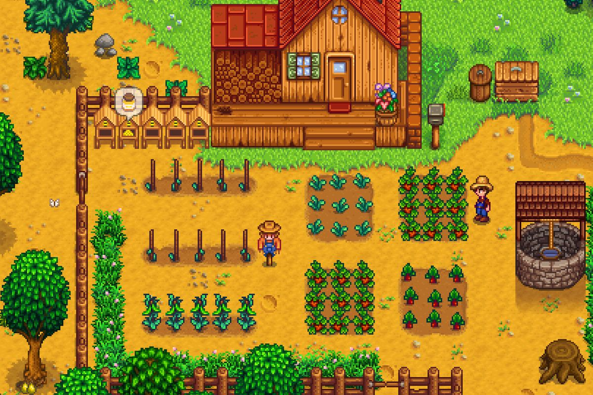 A screenshot of Stardew Valley: an overhead view of a player’s farm, with rows and patches of crops next to a farmhouse, all rendered in a low-resolution style.
