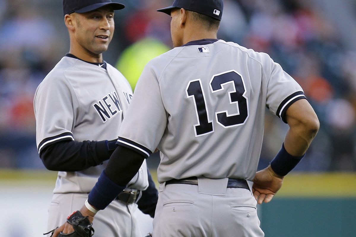 Derek Jeter (2) of the New York Yankees talks with Alex Rodriguez (13) while playing the Detroit Tigers at Comerica Park on May 4, 2011 in Detroit, Michigan. Detroit won the game 4-0.(Photo by Gregory Shamus/Getty Images)