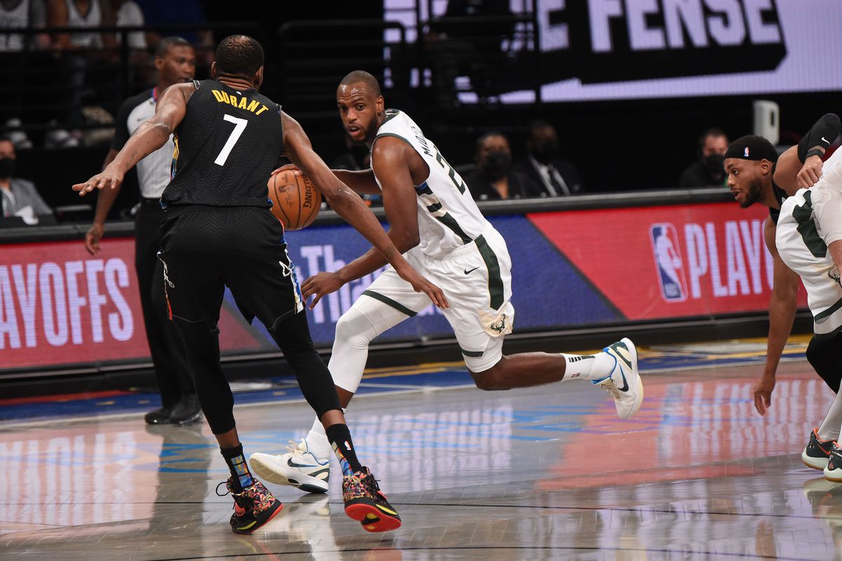 Khris Middleton handles the ball against Kevin Durant during Game 2 of Bucks-Nets on June 7, 2021
