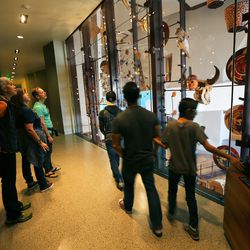 Visitors tour the Natural History Museum of Utah as it opens up the back rooms for visitors to see items that aren't out for regular viewing Saturday, Nov. 12, 2016.