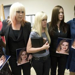 Family members Kimberly Popish, left, Jill Harper-Smith, Linda Cluff, Alexis Somers, and Rachel MacNeill talk to the media after attending a court hearing on Aug. 27, 2012. Martin Joseph MacNeill is charged with murder in the April 2007 death of his wife, Michele MacNeill.