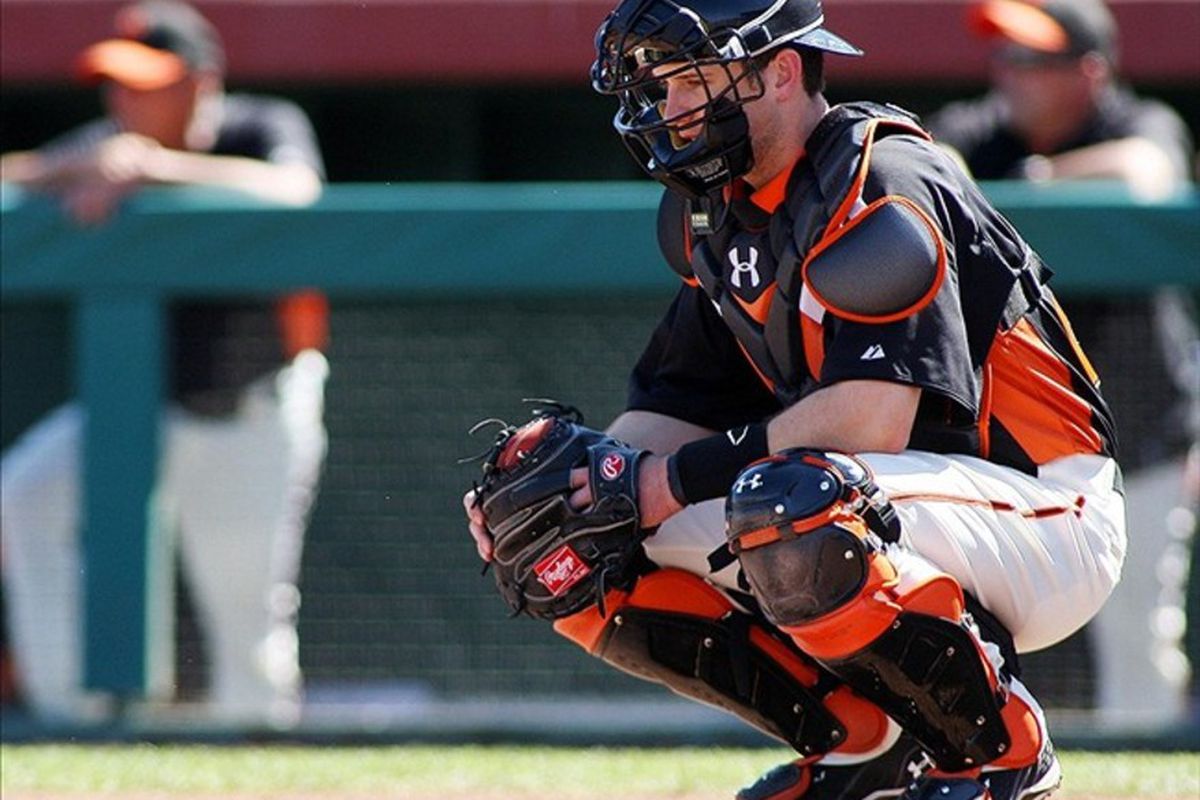Mar 13, 2012; Scottsdale, AZ, USA; San Francisco Giants catcher Buster Posey (28) during the third inning against the Chicago Cubs at Scottsdale Stadium.  Mandatory Credit: Jake Roth-US PRESSWIRE