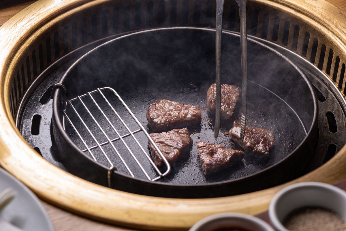 Beef grilling at Daedo Sikdang in Koreatown.