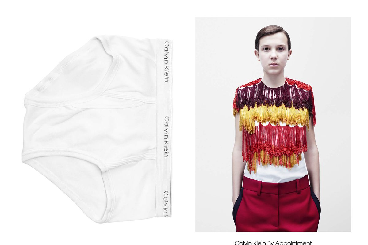 Millie Bobby Brown wears a red and yellow shirt and red trousers.