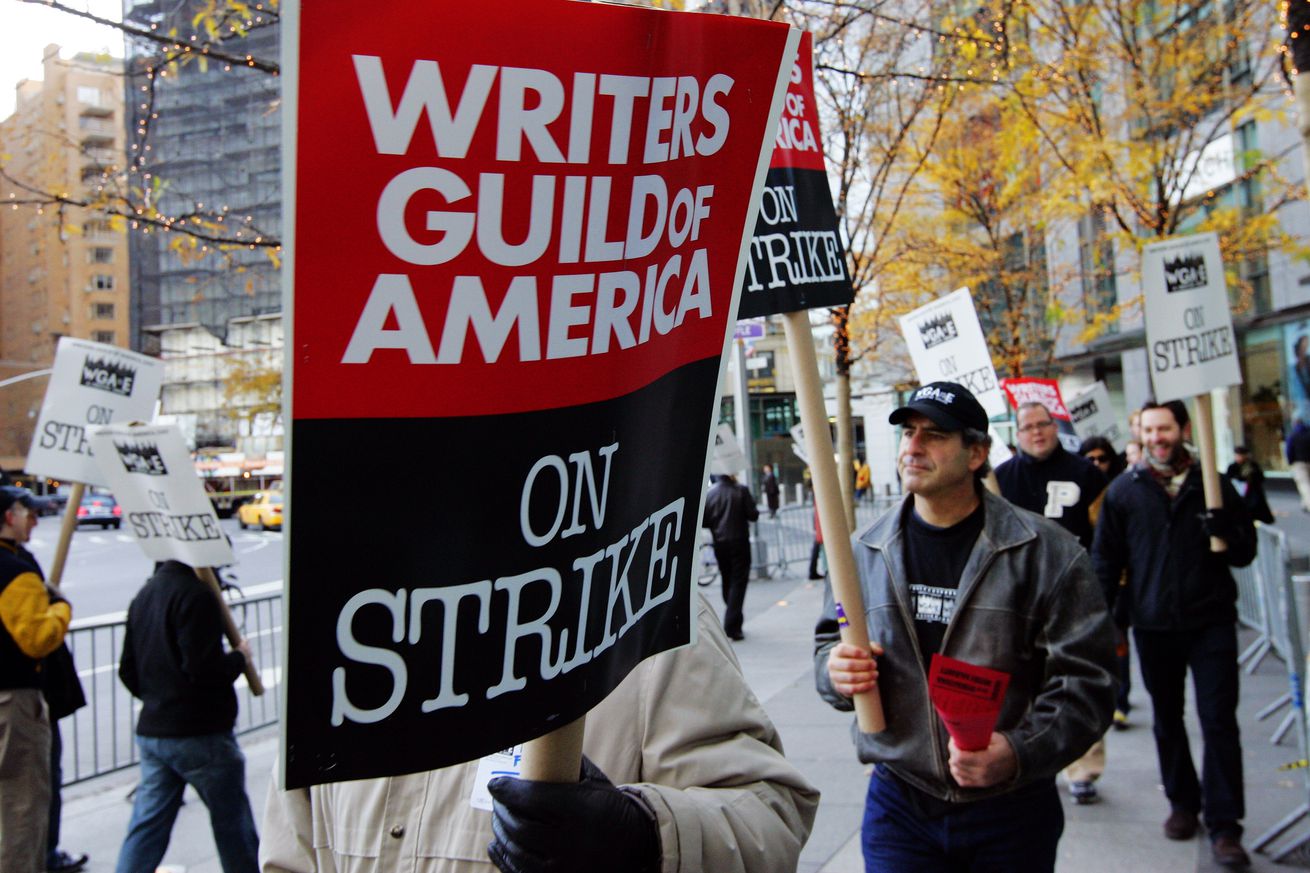 Striking Writers Rally At Time Warner Center In New York