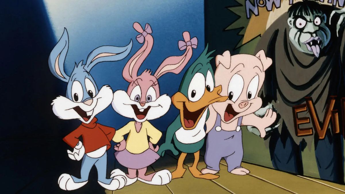 Buster Bunny, Babs Bunny, Plucky Duck y Hamon J. Pig sonríen alegremente en Night Ghoulery de Tiny Toons.