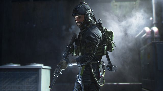 An image of a soldier in Call of Duty: Morden Warfare 2. The soldier is holding a gun as he carefully walks through a dark and smokey room. 