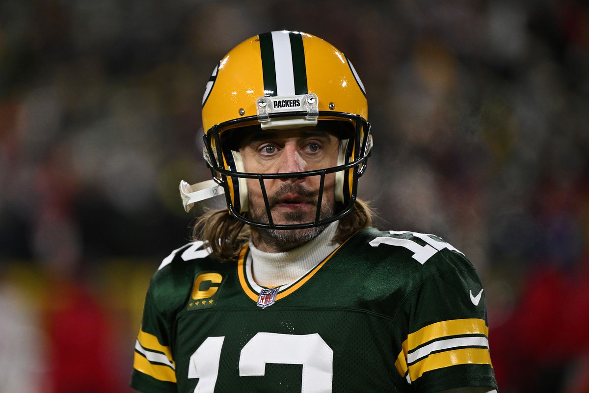 Green Bay Packers quarterback Aaron Rodgers wearing a football uniform and helmet.