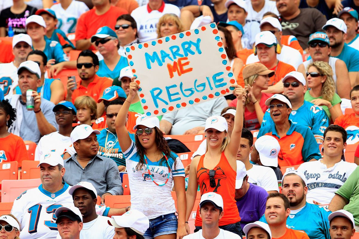 MIAMI GARDENS, FL - SEPTEMBER 16: Miami Dolphins fans hold a sign at the game against the Oakland Raiders at Sun Life Stadium on September 16, 2012 in Miami Gardens, Florida.  (Photo by Chris Trotman/Getty Images)