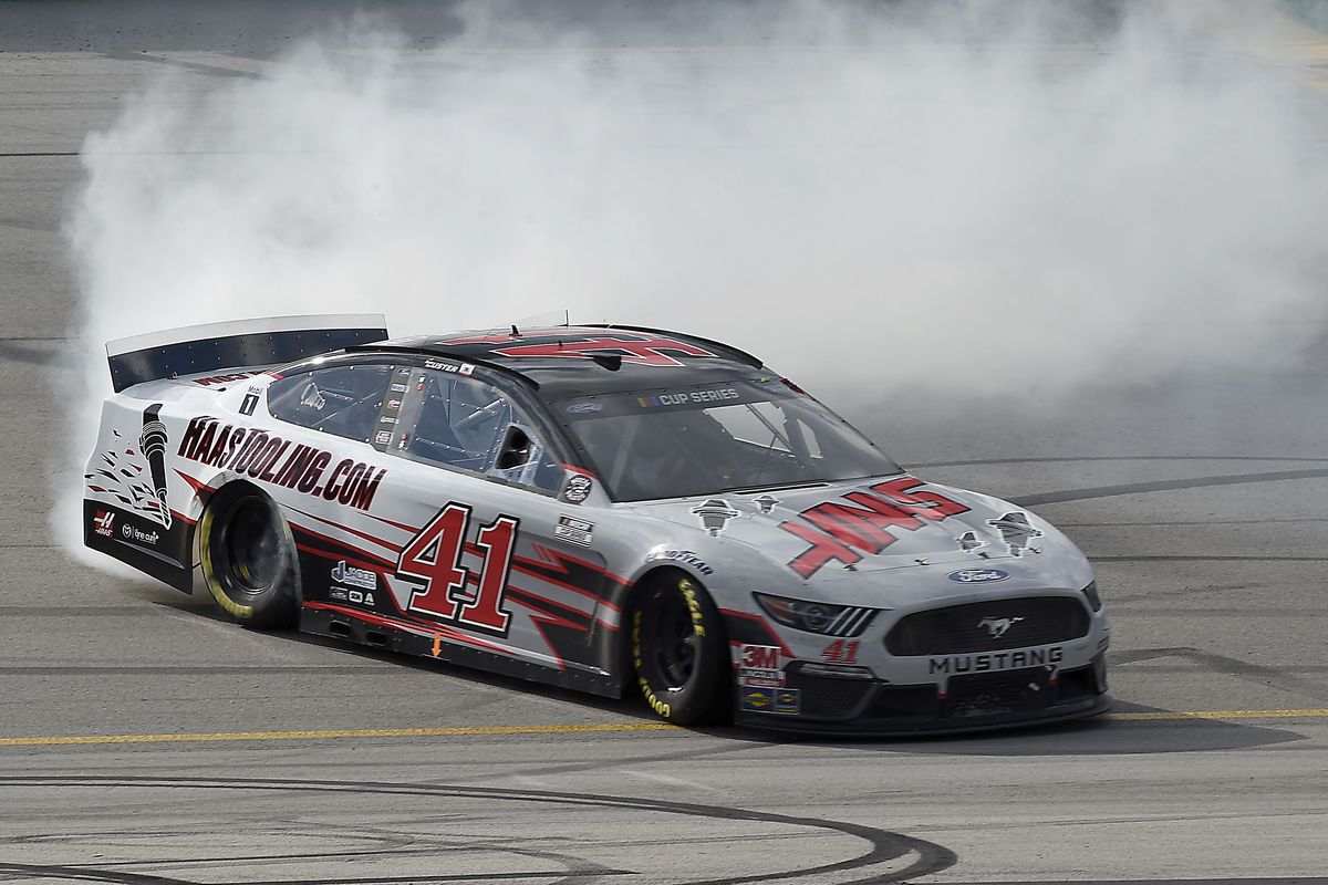 Cole Custer, driver of the #41 HaasTooling.com Ford, celebrates with a burnout after winning the NASCAR Cup Series Quaker State 400 Presented by Walmart at Kentucky Speedway on July 12, 2020 in Sparta, Kentucky.