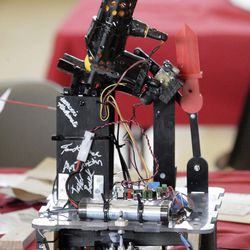 University of Utah mechanical engineering students designed autonomous robots to compete on a track and shoot pingpong balls at targets during Design Day in Salt Lake City Tuesday, April 16, 2013.