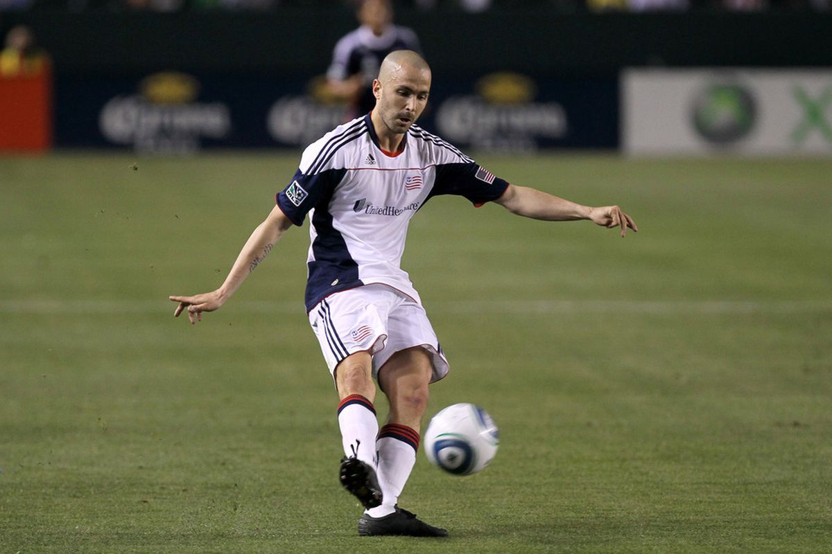 CARSON, CA - APRIL 30:  Rajko Lekic #10 of the New England Revolution centers the ball against Chivas USA at The Home Depot Center on April 30, 2011 in Carson, California.  (Photo by Stephen Dunn/Getty Images)