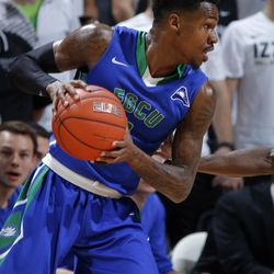 Florida Gulf Coast's Brandon Goodwin drives against Michigan State during the second half of an NCAA college basketball game, Sunday, Nov. 20, 2016, in East Lansing, Mich. Michigan State won 78-77. (AP Photo/Al Goldis)
