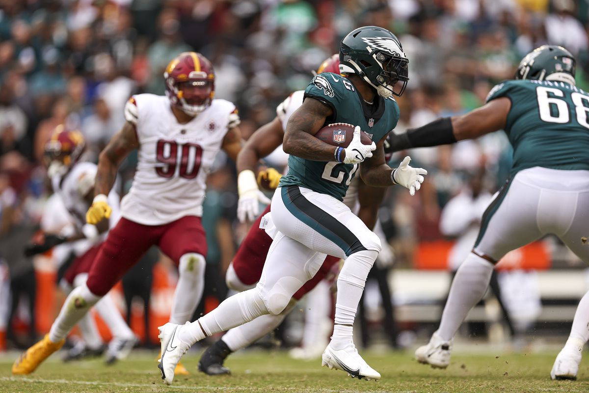 Running back Miles Sanders #26 of the Philadelphia Eagles runs the ball during the second half at FedExField on September 25, 2022 in Landover, Maryland.