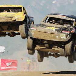 Rob Naughton (L) and Jeremy Stenberg celebrate during the Pro 2 Unlimited race Lucas Oil Off Road Series at Miller Motorsports Park in Tooele Sunday, June 26, 2011. Naughton won the race.