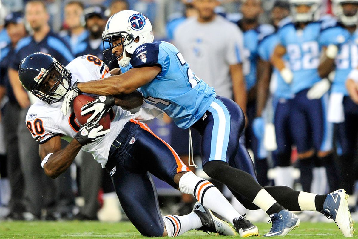 NASHVILLE, TN - AUGUST 27:  Chris Hope #24 of the Tennessee Titans tackles Earl Bennett #80 of the Chicago Bears during a preseason game at LP Field on August 27, 2011 in Nashville, Tennessee.  (Photo by Grant Halverson/Getty Images)