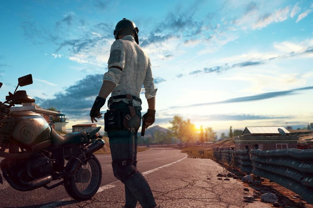 Playerunknown’s Battlegrounds - man and motorcycle at sunset