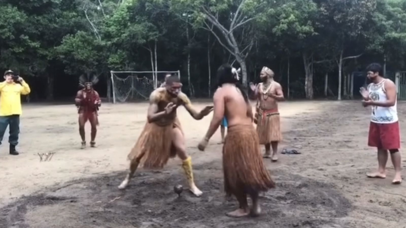 Video: Alex Pereira strips down to hula skirt, out-wrestles fake Khamzat in circle of dirt