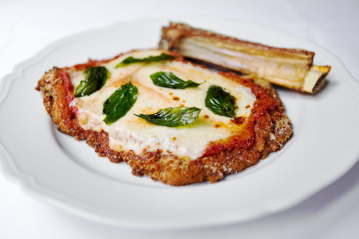 A plate of veal parmesan from Carbone Dallas.