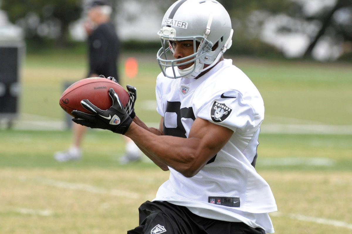 Oakland Raiders rookie receiver Rod Streater (80) catches a pass at organized team activities