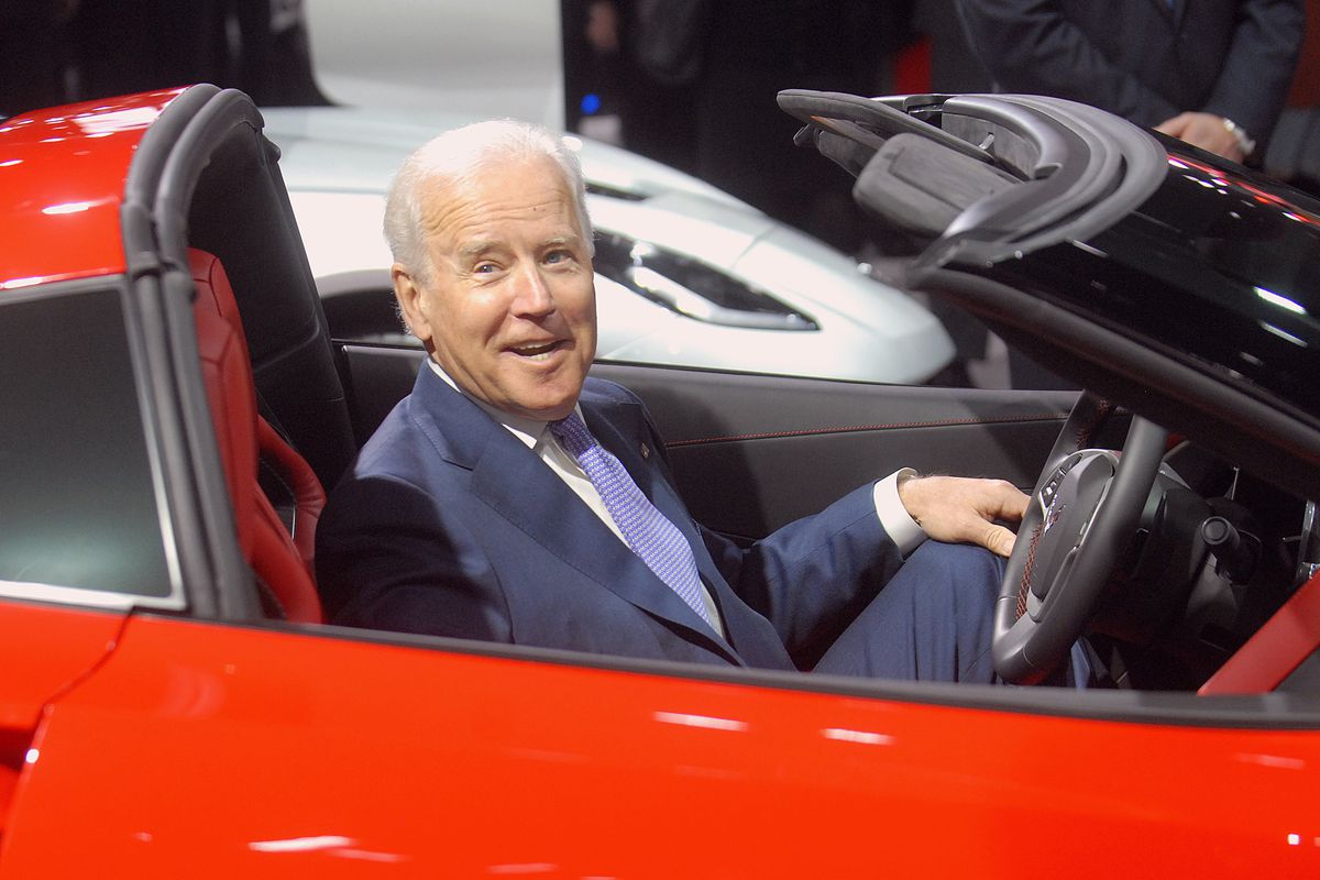 Biden sits in a Corvette at the North American International Auto Show industry preview on January 16, 2014 in Detroit, Michigan.