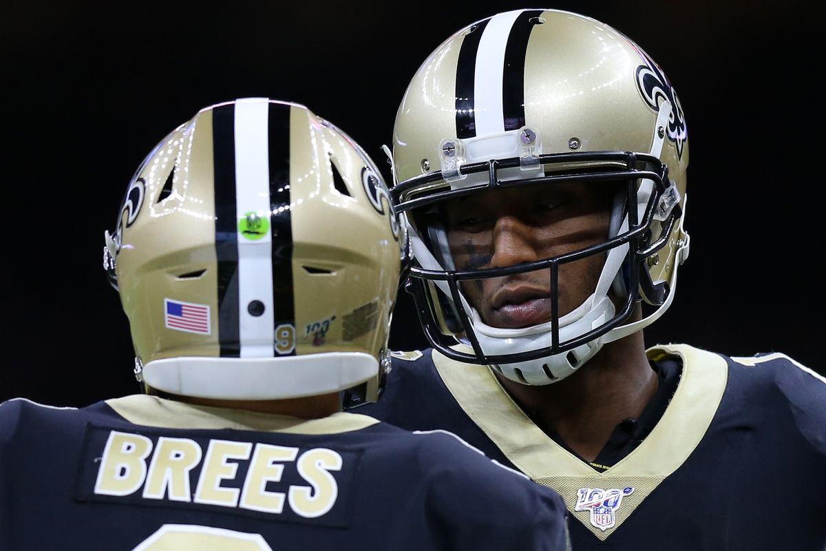 Michael Thomas #13 of the New Orleans Saints and Drew Brees #9 talk during a game against the Arizona Cardinals at the Mercedes Benz Superdome on October 27, 2019 in New Orleans, Louisiana.