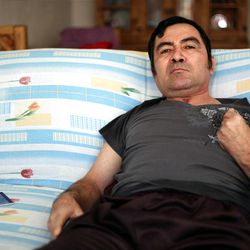 In this Thursday March 7, 2013 photo, Jacinto Rodriguez Cruz, 49, sits on a sofa inside his home in the city of Veracruz, Mexico.  Cruz and another friend suffered serious injuries during a car accident last May 2008 in northwestern Iowa. After their employers insurance coverage ran out, Cruz, who was not a legal citizen, was placed on a private airplane and flown to Mexico still comatose and unable to discuss his care or voice his protest. Hospitals confronted with absorbing the cost of caring for uninsured seriously injured immigrants are quietly deporting them, often unconscious and unable to protest, back to their home countries. (AP Photo/Felix Marquez)