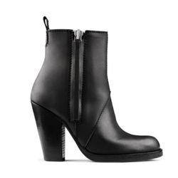 <b>Acne</b> Colt boots in black, <a href="http://shop.acnestudios.com/shop/women/shoes/colt-105291.html">$580</a>