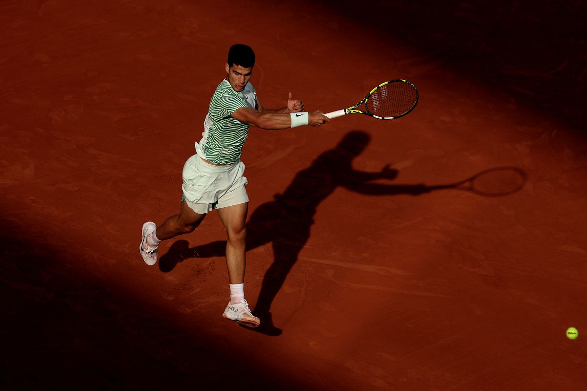 Carlos Alcaraz of Spain in action against Flavio Cobolli of Italy during their Men’s Singles First Round Match on Day Two of the 2023 French Open at Roland Garros on May 29, 2023 in Paris, France.