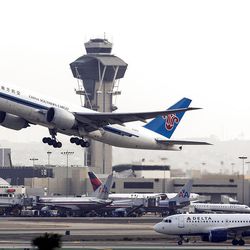 A China Southern Cargo jet takes off at LAX International airport in Los Angeles Monday, April 22, 2013. Some fliers headed to Los Angeles International Airport were met with delays yesterday on the first day of staffing cuts for air traffic controllers because of government spending reductions. Budget cuts that kicked in last month forced the FAA to give controllers extra days off. (AP Photo/Damian Dovarganes)