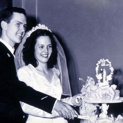 Russell and Dantzel Nelson cut their wedding cake on Aug. 31, 1945.