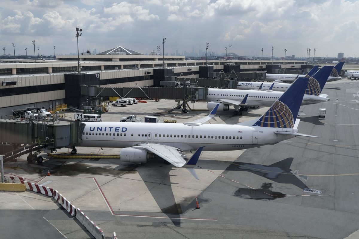 United Airlines planes are parked at gates at Newark Liberty International Airport in Newark, N.J., Wednesday, July 1, 2020.